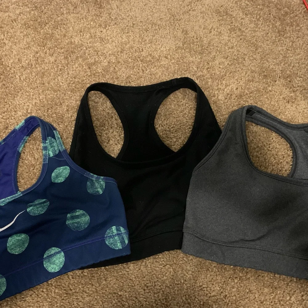 Three sports bras! All size medium. - Picture 1 of 9